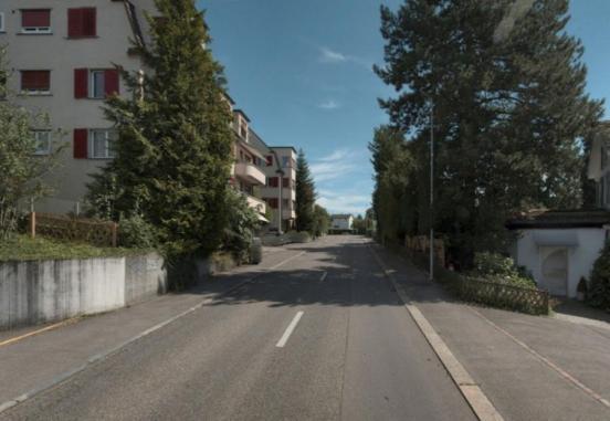 Farbaufnahme der Zollikerstrasse in Zollikon im heutigen Zustand.