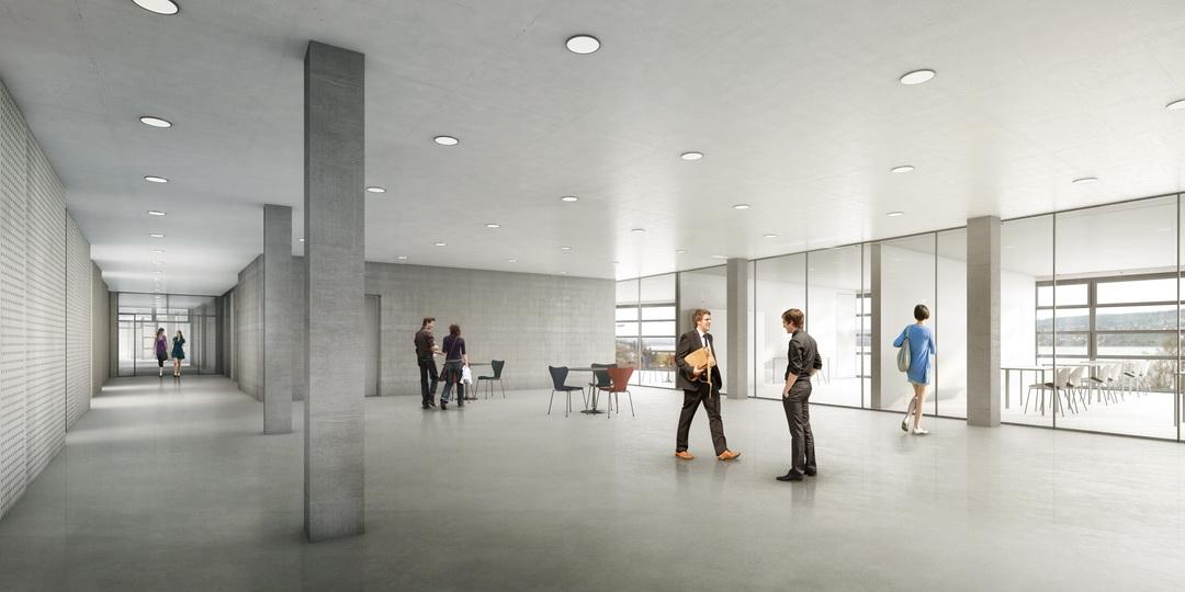 In grau gehaltener, grosszügiger Innenraum mit Personen Stützen in Sichtbeton und Sitzgelegenheiten.