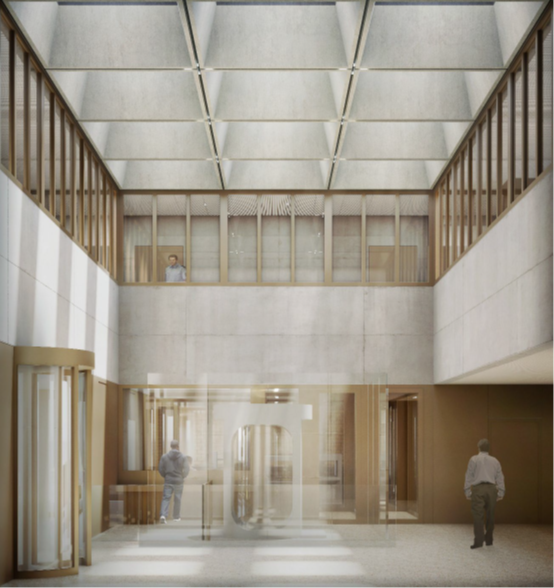 Innenansicht des Eingangsbereichs der Justizvollzugsanstalt Pöschwies. Der Raum zeichnet sich durch hohe Decken, viel Glas und ein modernes, offenes Design aus. Menschen bewegen sich durch den hellen, lichtdurchfluteten Raum.