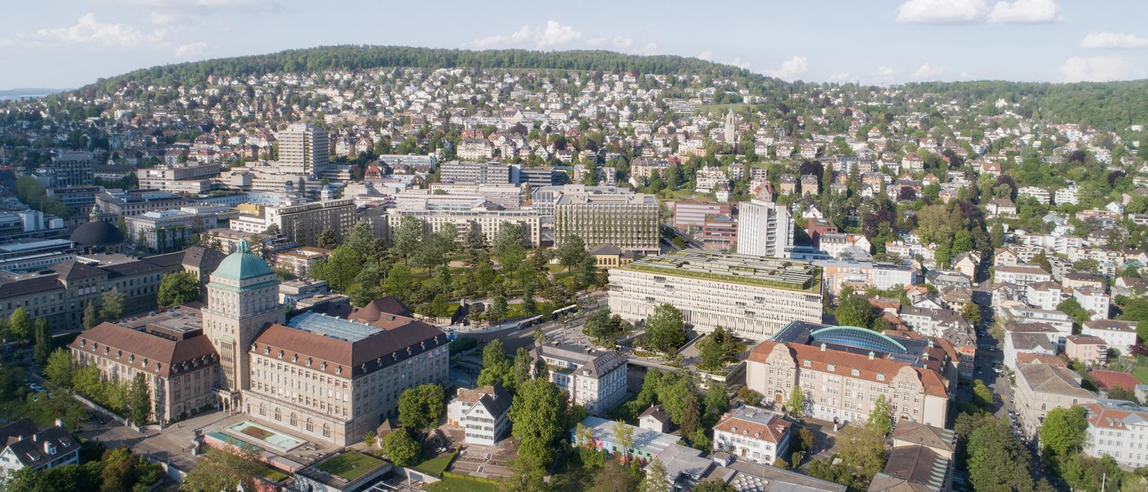 Blick von oben auf das künftige Hochschulgebiet Zürich Zentrum mit der Universität, der ETH und dem Universitätsspital Zürich sowie Grünflächen, im Hintergrund ist der Zürichberg zu sehen.