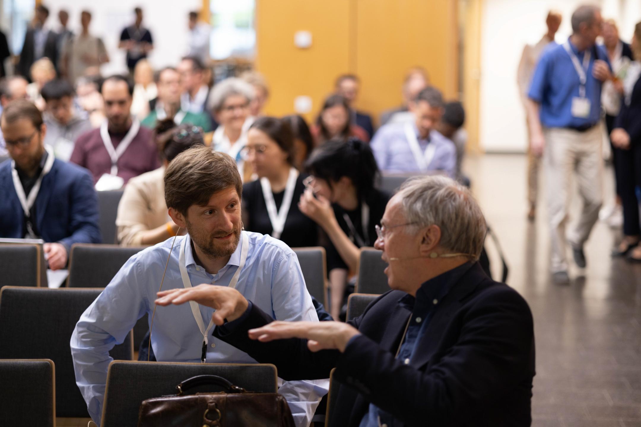 Keynote Speakers Bernd Bodenmiller & Hans Clevers unterhalten sich an der Life Science Zurich Impact Conference 2023